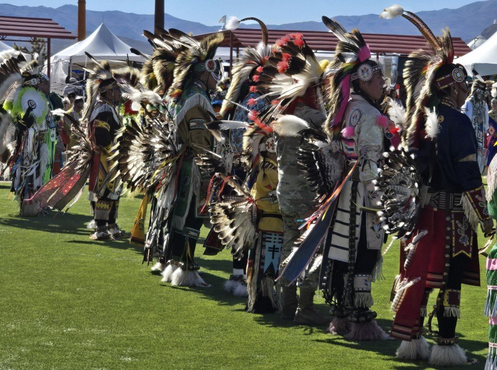 Snow Mountain Paiute Pow Wow Grand Entry - a group of men listen patiently.