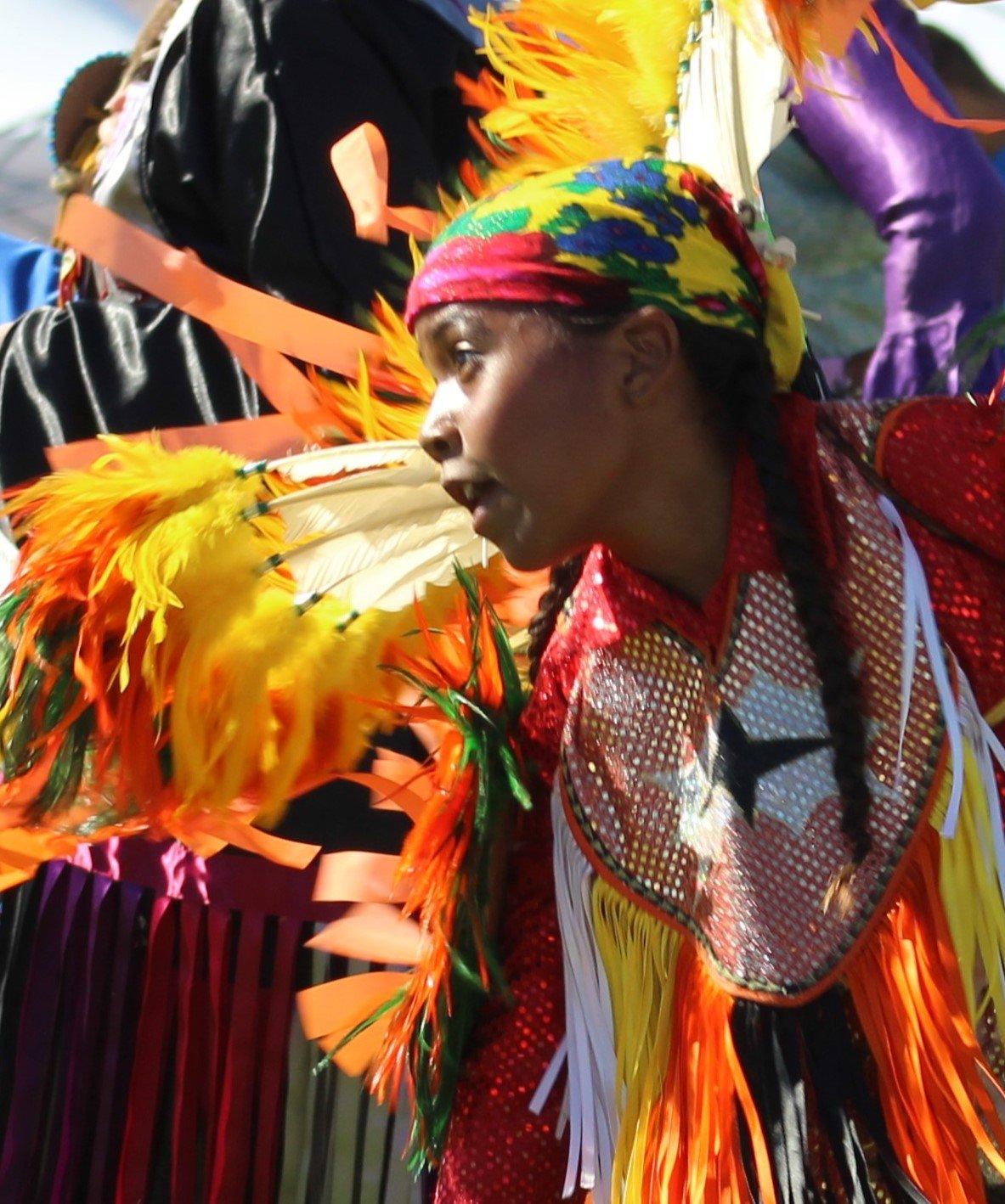 Snow Mountain Paiute Pow Wow Grand Entry - a closeup of a young boy enjoying himself.