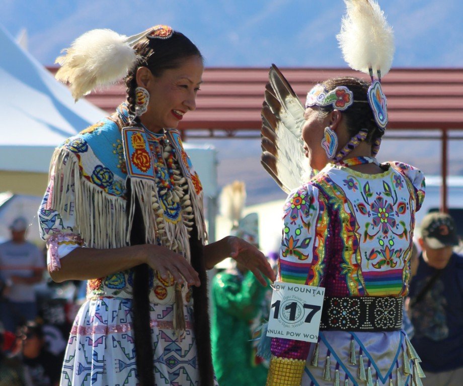 Snow Mountain Paiute Pow Wow Grand Entry - two friends reunite at the end of the Grand Entry.