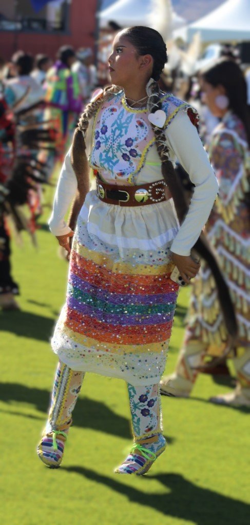 Snow Mountain Paiute Pow Wow Grand Entry - A young woman looking for someone at the end of the Grand Entry.