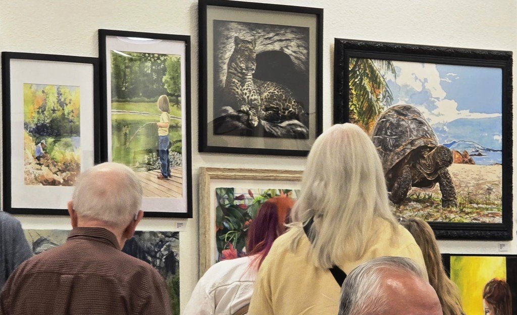 It was standing-room-only packed audience of art lovers.  Artwork by two-hundred and seventy talented artists was submitted.  Competition was tough and the artists chosen were very adept in their technique.  It was an exciting evening.