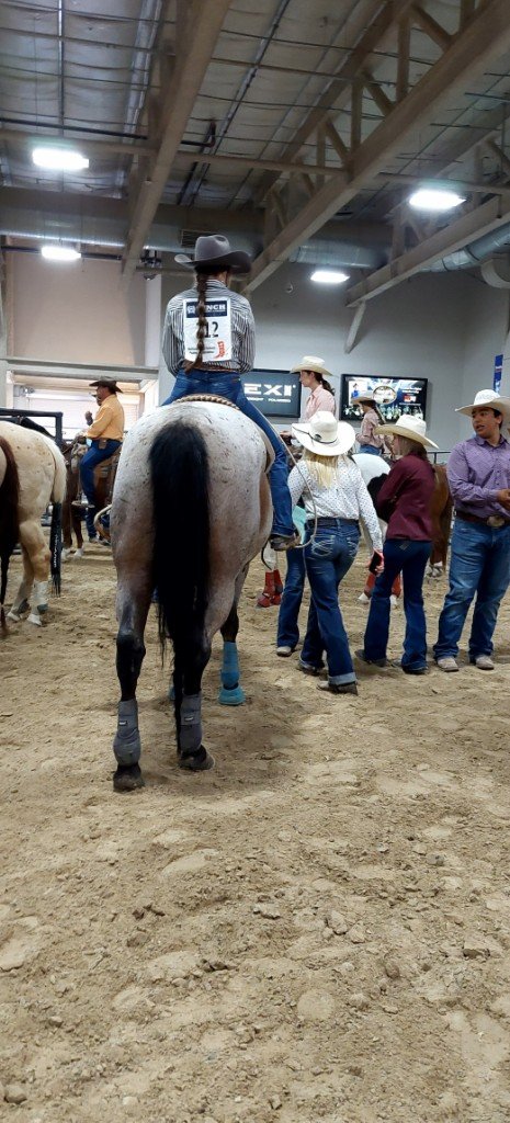 Pre-rodeo, contestants and their horses wait for the National Anthem as seen at: Rodeo Priefert Pavilion; Rodeo South Point Arena; Rodeo South Point; & Rodeo NSHSRA.