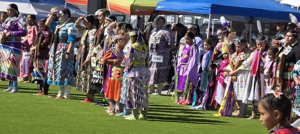 Snow Mountain Paiute Pow Wow Grand Entry as groups of women and children are lined up to listen to a parade of speakers.