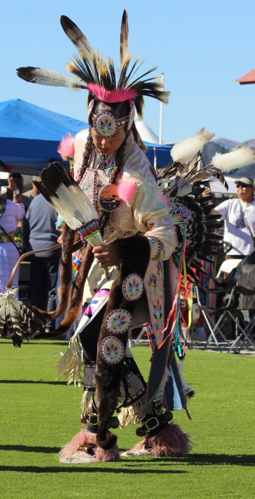 Snow Mountain Paiute Pow Wow Grand Entry as a serious young man follows the traditional Paiute Chicken dance as seen in Powwows: Cedar; Cedar City; Duck Valley; Elko; Ely; Fallon; Fort Mojave; Goshute; Moapa; Muckleshoot; Nevada Day; Numaga; Red Dress; Sacred Visions; Stewart; Sycuan; UNLV;  UNR; Univ. of Nev. Reno; and Walker River; Western Navajo Fair.
