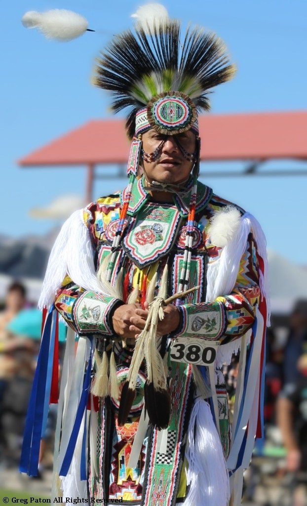 Dashing Native American male walk s the Grand Entry as seen in powwows: Chippewa; Choctaw; Choctaw Nation; Comanche; Crow; Dakota; Haudenosaunee; Hopi; Iroquois; and Iroquois Confederacy,