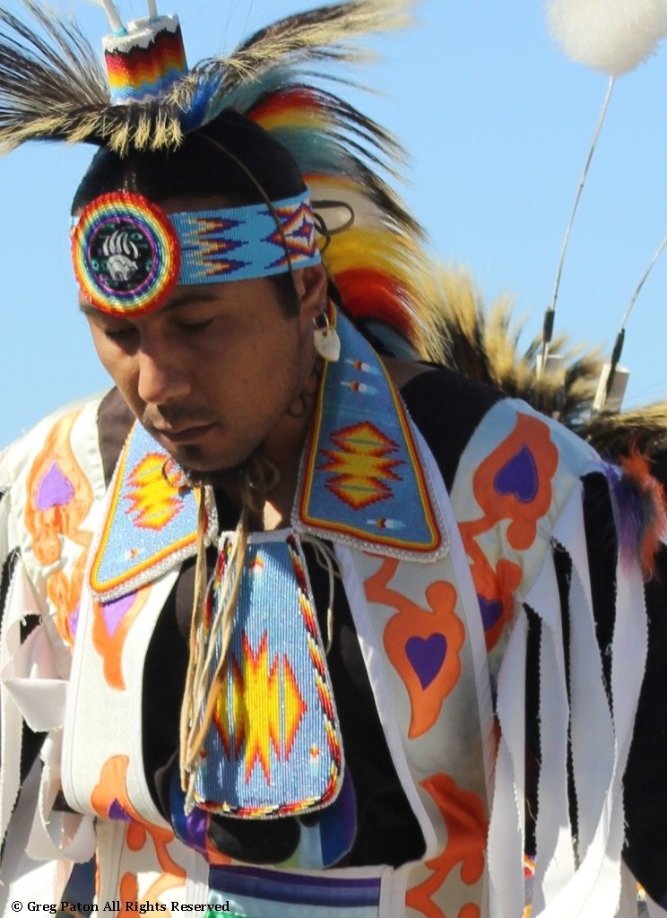 Closeup Native American in Grand Entry as seen in powwows: Chippewa; Choctaw; Choctaw Nation; Comanche; Crow; Dakota; Haudenosaunee; Hopi; Iroquois; and Iroquois Confederacy,