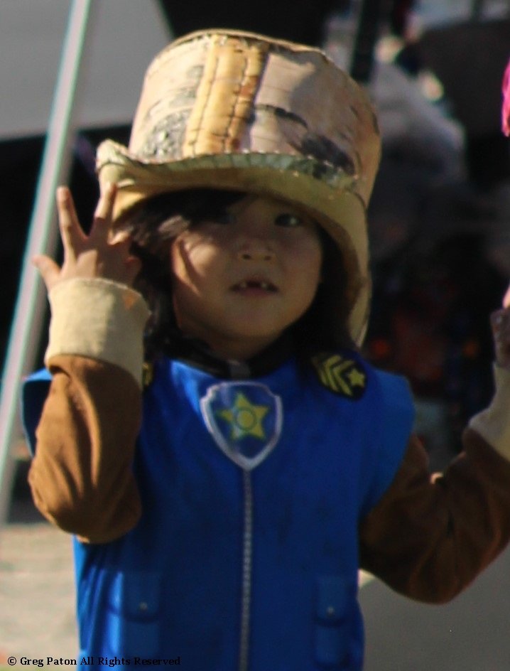 Grand Entry Native American child as seen in powwows: Oglala; Rosebud Sioux; Shoshone; Sioux; Tohono; Wacipi; Wampanoag; Yaqui; & Zuni.